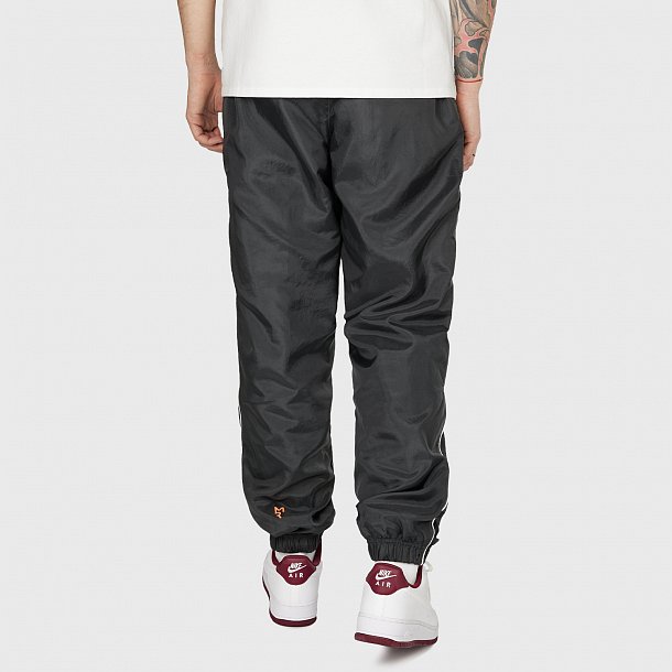 Брюки Nike Woven Pants X Marcus Rashford - фото 2